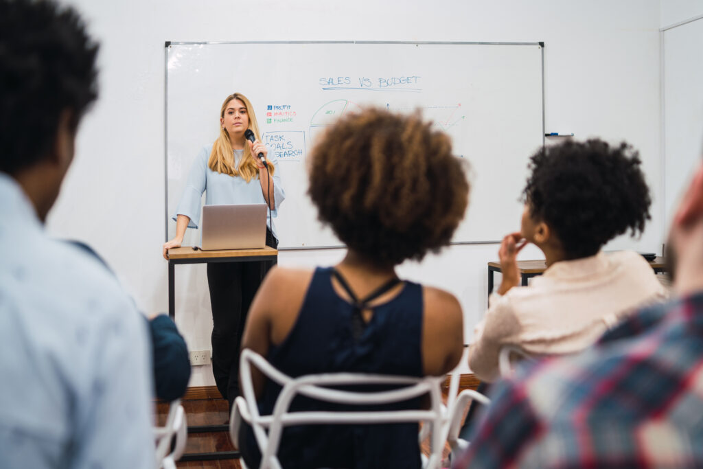 business woman explaining plan of work in conference.