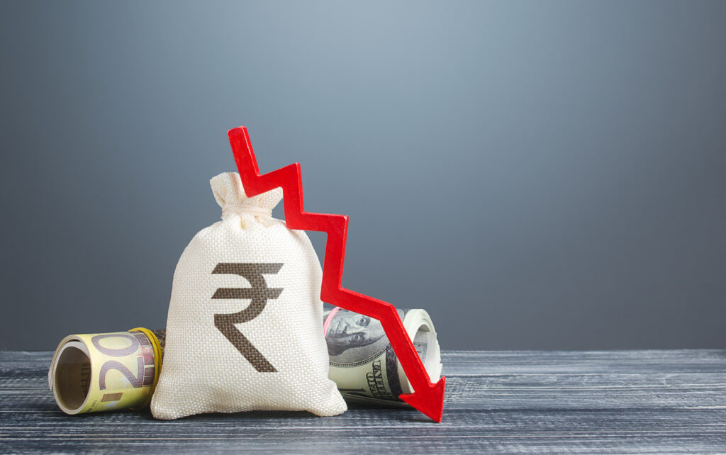 Indian,Rupee,Money,Bag,And,Red,Arrow,Down.,Economic,Difficulties.