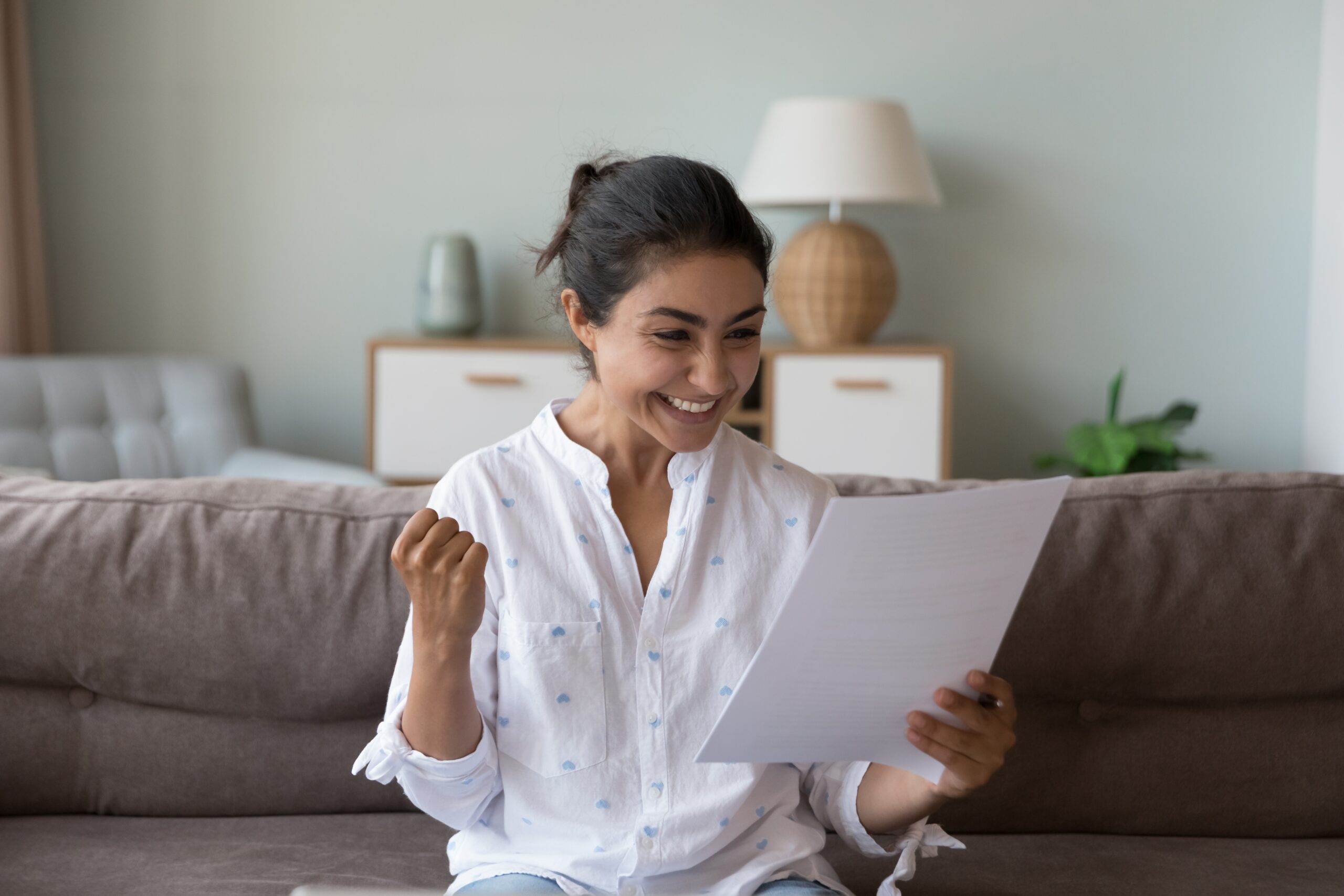 Excited,Cheerful,Young,Indian,Woman,Getting,Good,News,Letter,,Reading